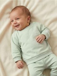 Bawełniana bluza z napisem na plecach - zielony. Zielone bluzy damskie Sinsay, l, bez wzorów, z bawełny, sportowe, bez ramiączek, bez kaptura. Za 11.99 zł.