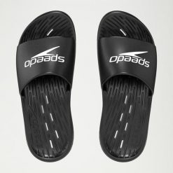 Klapki basenowe antypoślizgowe damskie Speedo Slides. Czarne klapki damskie Speedo, na lato, bez wzorów, z materiału, bez obcasa, bez zapięcia. Za 68.59 zł.