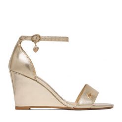 Sandały MEXX. Żółte sandały damskie Mexx, bez wzorów, bez obcasa, na koturnie, bez zapięcia. Za 299.99 zł.