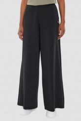 GUESS Czarne damskie spodnie dresowe Olympe Wide Leg, Rozmiar XS. Czarne spodnie sportowe damskie Guess, z aplikacjami, z dresówki, sportowe. W wyprzedaży za 359.99 zł.