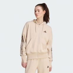 Bluza dresowa Seasonal Essentials Animal Print 3-Stripes Full-Zip Hooded. Białe bluzy damskie Adidas, l, bez wzorów, z bawełny, klasyczne, bez ramiączek, z kapturem. Za 279.00 zł.
