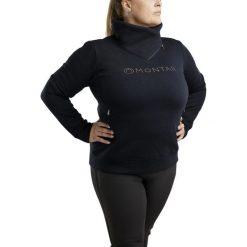 Damska bluza jeździecka z zamkiem błyskawicznym Montar Naja. Niebieskie bluzy damskie MONTAR, xl, bez wzorów, z bawełny, eleganckie, bez ramiączek, bez kaptura. Za 345.00 zł.