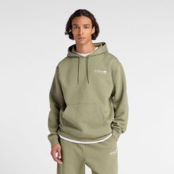 Bluza męska New Balance MT53528DEK – zielona. Zielone bluzy męskie New Balance, m, bez wzorów, z bawełny, z kapturem. Za 329.99 zł.
