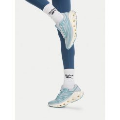 Buty do biegania Reebok. Niebieskie obuwie sportowe damskie Reebok, bez wzorów, bez zapięcia, do biegania. Za 349.99 zł.