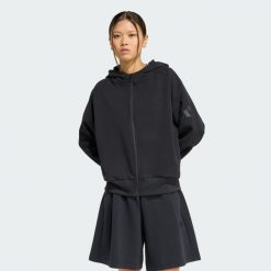 BLUZA Z KAPTUREM SOFT LUX Z SUWAKIEM NA CAŁEJ DŁUGOŚCI. Czarne bluzy damskie Adidas, xl, bez wzorów, z bawełny, klasyczne, bez ramiączek, z kapturem. Za 349.00 zł.