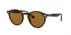 Okulary przeciwsłoneczne Ray-Ban RB2180. Brązowe okulary przeciwsłoneczne damskie Ray-Ban, okrągłe. Za 589.99 zł.
