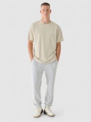 4F T-shirt oversize z nadrukiem męski - beżowy S. Brązowe t-shirty męskie 4F, m, bez wzorów, z bawełny, bez kołnierzyka, bez ramiączek. W wyprzedaży za 29.99 zł.