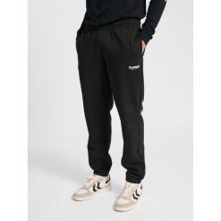 Spodnie do biegania Hummel Legacy 2.0. Czarne spodnie materiałowe męskie Hummel, bez wzorów, z dresówki. Za 269.50 zł.