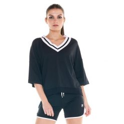 Czarno-biała bluza damska z dekoltem w kształcie litery V. Czarne bluzy damskie LEONE 1947 APPAREL, l, bez wzorów, z tkaniny, casualowe, bez ramiączek, bez kaptura. W wyprzedaży za 139.75 zł.