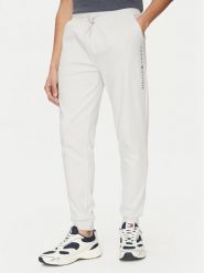 Tommy Hilfiger Spodnie dresowe UM0UM03348 Beżowy Regular Fit. Brązowe spodnie sportowe męskie Tommy Hilfiger, m, bez wzorów, z bawełny. Za 219.99 zł.