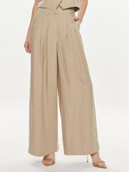 Herskind Spodnie materiałowe Lotus 5114840 Beżowy Relaxed Fit. Brązowe spodnie materiałowe damskie Herskind, bez wzorów, z materiału. Za 779.99 zł.