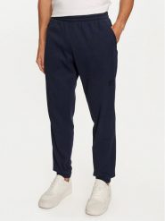 Adidas Spodnie dresowe Trefoil Essentials IY2305 Granatowy Regular Fit. Niebieskie spodnie sportowe męskie Adidas, m, bez wzorów, z dresówki. Za 239.99 zł.