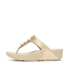Klapki z platformą z palcem u nogi damskie FitFlop Lulu Ultra-Jewel Metallic. Szare klapki damskie FIT FLOP, bez wzorów, z materiału, eleganckie, bez obcasa, na koturnie, bez zapięcia. Za 633.00 zł.
