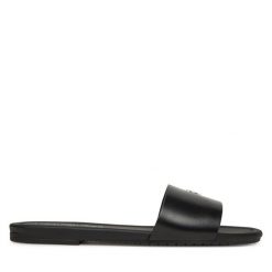 Klapki Calvin Klein Jeans. Czarne klapki damskie Calvin Klein Jeans, bez wzorów, z jeansu, bez obcasa, bez zapięcia. Za 209.99 zł.