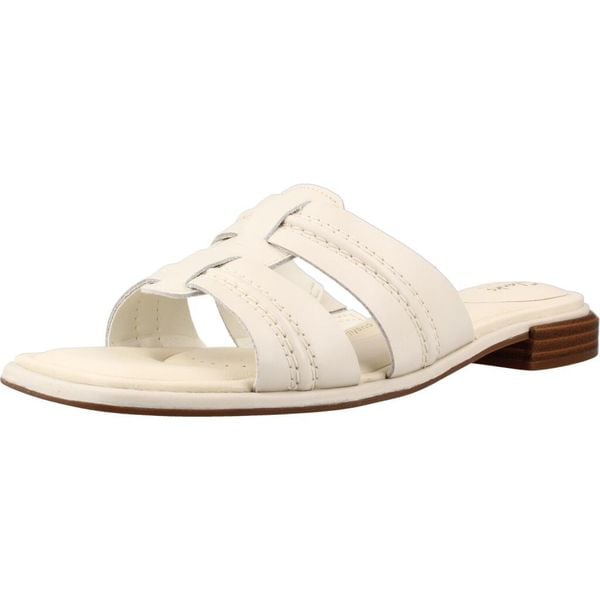 Sandały CLARKS ARIANY MULE Biały. Białe sandały damskie Clarks, bez wzorów, ze skóry, bez obcasa, bez zapięcia. Za 221.99 zł.