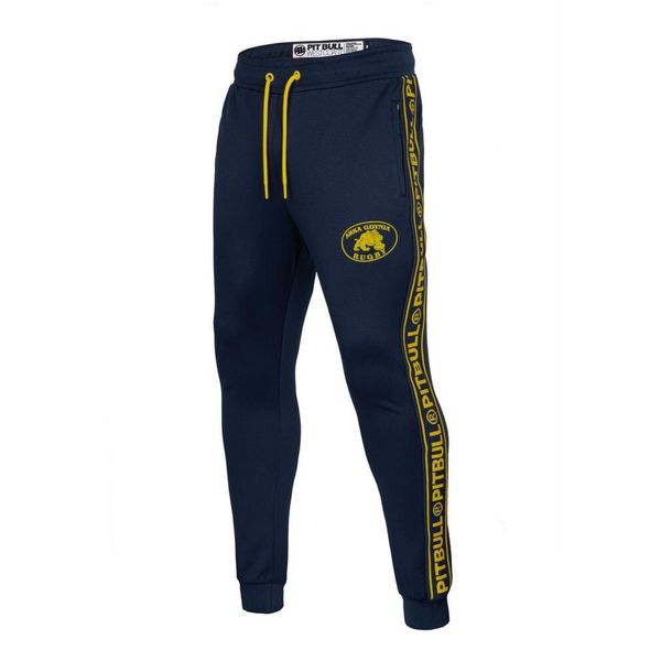 Spodnie męskie Pitbull dresowe Oldschool Tape Logo Rugby Arka Gdynia. Niebieskie spodnie sportowe męskie PITBULL, m, bez wzorów, z dresówki, na fitness i siłownię. Za 189.00 zł.