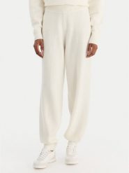 Calvin Klein Underwear Spodnie dresowe LV00QS7569 Écru Regular Fit. Spodnie dresowe damskie Calvin Klein Underwear, bez wzorów, z dresówki. Za 299.99 zł.