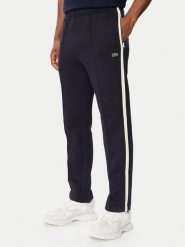 Lacoste Spodnie dresowe XH8615 Granatowy Regular Fit. Niebieskie spodnie sportowe męskie Lacoste, m, bez wzorów, z bawełny. Za 769.99 zł.