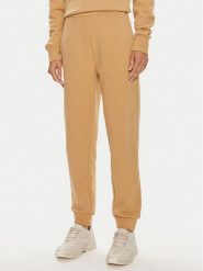 Calvin Klein Spodnie dresowe Nano Logo K20K207214 Beżowy Relaxed Fit. Brązowe spodnie dresowe damskie Calvin Klein, bez wzorów, z bawełny. Za 249.99 zł.