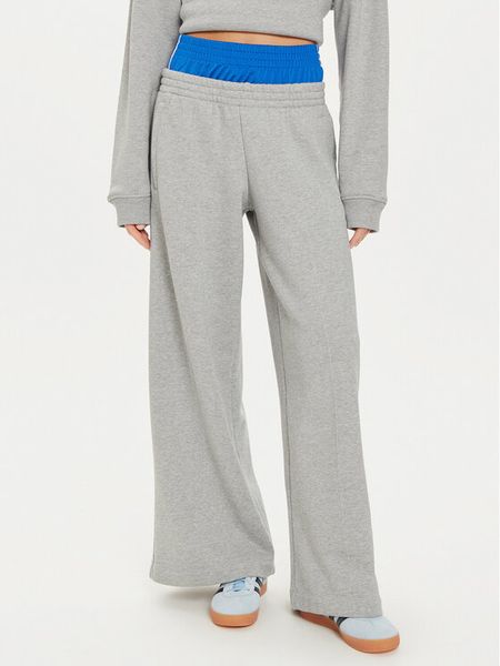 Adidas Spodnie dresowe Kseniaschnaider IW5670 Szary Loose Fit. Szare spodnie dresowe damskie Adidas, bez wzorów, z bawełny. Za 429.99 zł.