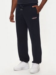 Guess Jeans Spodnie dresowe M4YB18 K9V31 Granatowy Regular Fit. Niebieskie spodnie sportowe męskie Guess Jeans, m, z aplikacjami, z bawełny. Za 239.99 zł.
