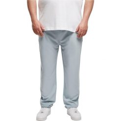 Spodnie dresowe Urban Classics Tapered. Niebieskie spodnie sportowe męskie Urban Classics, m, bez wzorów, z dresówki. Za 237.00 zł.