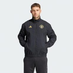 Bluza Manchester United Stone Roses Anthem. Czarne bluzy męskie Adidas, xs, bez wzorów, z materiału, sportowe, bez ramiączek, bez kaptura. W wyprzedaży za 349.65 zł.