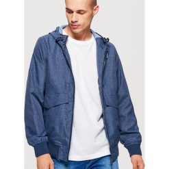 Sportowa kurtka z kapturem - Granatowy. Niebieskie kurtki sportowe damskie Cropp, l, bez wzorów, z kapturem. Za 169.99 zł.