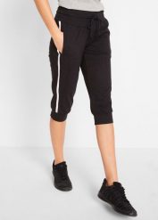Spodnie sportowe 3/4 z bawełny. Czarne spodnie dresowe damskie bonprix, bez wzorów, z bawełny, sportowe. Za 92.99 zł.