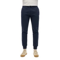 Jednolite spodnie dresowe Superdry. Niebieskie spodnie sportowe męskie Superdry, m, bez wzorów, z dresówki. Za 342.70 zł.