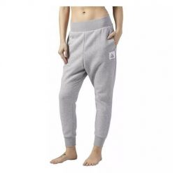 Spodnie sportowe damskie Reebok Workout. Szare spodnie dresowe damskie Reebok, bez wzorów, z dresówki, sportowe, długie. Za 357.00 zł.