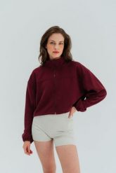Kurtka sportowa Moonholi Uptown z zamkiem. Czerwone kurtki sportowe damskie MOONHOLI, m, bez wzorów, bez ramiączek, bez kaptura, na fitness i siłownię. Za 399.00 zł.