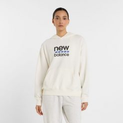 Bluza damska New Balance WT51519SST – beżowa. Brązowe bluzy damskie New Balance, xl, bez wzorów, z bawełny, klasyczne, bez ramiączek, bez kaptura. Za 169.99 zł.
