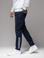 Męskie jeansowe joggery z lampasami – ciemnoniebieskie V4 OM-PADJ-0156 - XXL. Niebieskie spodnie materiałowe męskie Ombre Clothing, l, bez wzorów, z bawełny. Za 161.99 zł.