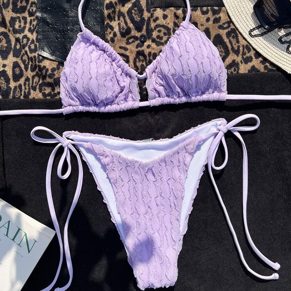 Bikini prążkowane na plażę regulowane ramiączka Ruveyda. Fioletowe bikini Intica, l, bez wzorów, z materiału. Za 139.00 zł.