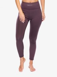 Legginsy damskie Super.natural High Rise Tight. Fioletowe legginsy damskie super.natural, bez wzorów, z materiału. Za 284.89 zł.