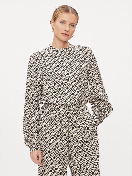 Tommy Hilfiger Bluzka WW0WW41022 Beżowy Regular Fit. Brązowe bluzki damskie Tommy Hilfiger, bez wzorów, z wiskozy, bez kołnierzyka, bez ramiączek. Za 309.99 zł.