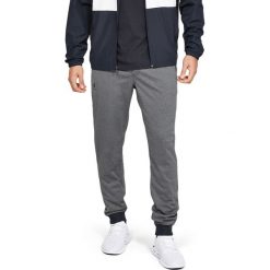 Under Armour Sportstyle Spodnie dresowe Szary. Szare spodnie sportowe męskie Under Armour, m, bez wzorów, z dresówki. Za 274.95 zł.