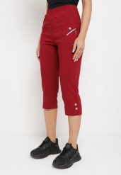 Bordowe Spodnie 3/4 z Elastyczną Gumką w Pasie i Suwakami Leazira. Czerwone spodnie materiałowe damskie Born2be, bez wzorów, z jeansu, eleganckie. Za 44.99 zł.