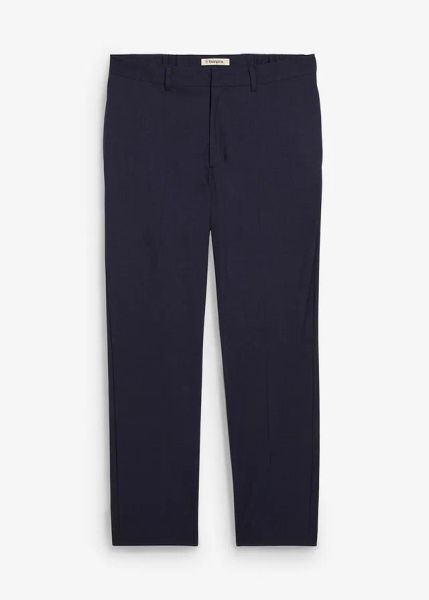 Spodnie garniturowe o kroju relaxed fit. Niebieskie eleganckie spodnie męskie bonprix, bez wzorów. Za 169.99 zł.
