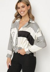 Czarna Koszula o Kroju Oversize z Wiskozą Zdobiona Kwiatową Aplikacją Zelbia. Czarne koszule damskie Born2be, l, z aplikacjami, z bawełny, eleganckie, bez kołnierzyka, bez ramiączek. W wyprzedaży za 95.99 zł.