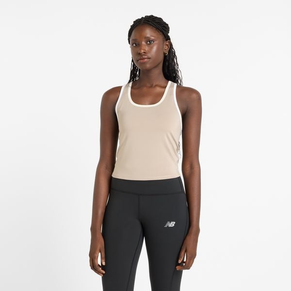 Koszulka damska New Balance WT51401ADS – beżowa. Brązowe koszulki sportowe damskie New Balance, m, z aplikacjami, z materiału, bez ramiączek. Za 189.99 zł.