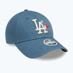 Czapka z daszkiem damska New Era Denim Icon 9Forty Los Angeles Dodgers. Niebieskie czapki damskie New Era, bez wzorów, z denimu. Za 129.99 zł.