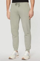 GUESS Zielone męskie spodnie Aldwin. Zielone spodnie sportowe męskie Guess, l, z aplikacjami, z dresówki. W wyprzedaży za 251.99 zł.