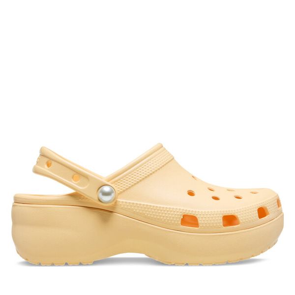 Klapki Crocs. Żółte klapki damskie Crocs, bez wzorów, bez obcasa, bez zapięcia. Za 399.99 zł.