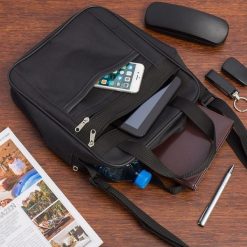 Męska torba na ramię raportówka A4 listonoszka czarna pojemna elegancka czarna F54. Czarne torby na ramię męskie na ramię. Za 54.90 zł.