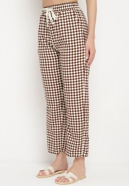 Brązowo-Beżowe Spodnie z Wysokim Stanem i Gumką w Pasie Korolla. Brązowe spodnie materiałowe damskie Born2be, z aplikacjami, z jeansu, eleganckie, z podwyższonym stanem. Za 29.99 zł.