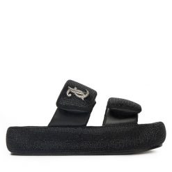 Klapki Juicy Couture. Czarne klapki damskie Juicy Couture, bez wzorów, bez obcasa, bez zapięcia. Za 249.99 zł.