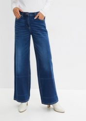 Jeansy wide leg ze średnim stanem i wygodnym pasem. Niebieskie jeansy damskie bonprix, bez wzorów, z jeansu. Za 159.99 zł.