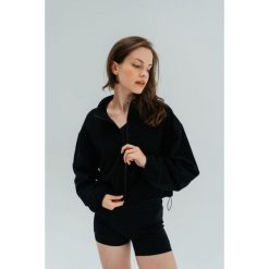 Kurtka sportowa Moonholi Uptown z zamkiem. Czarne kurtki sportowe damskie MOONHOLI, bez wzorów, bez ramiączek, bez kaptura, na jogę i pilates. Za 399.00 zł.